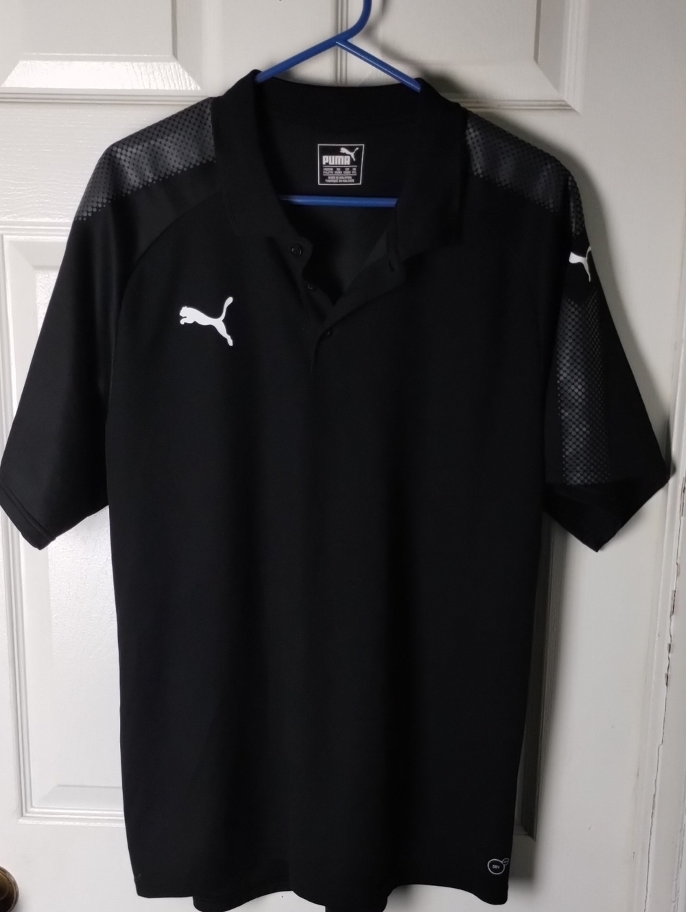 Puma Black Polo with White Puma Logos and Textured Shoulder Panels. Size XXL
